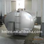 Milk cooling tank with cleaning system