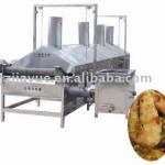 Continuous shrimp frying machine