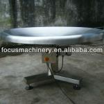 Auto rotating collection table