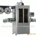Automatic labeling machine for plastic bottles