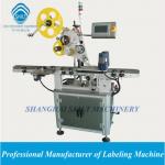 Automatic top labeling machine