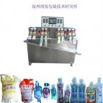 dairy milk and coffee stand up pouch with cap fill seal and cap machine