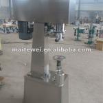 Nut can seaming machine