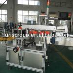 Adhesive sticker labeling machine for square bottle