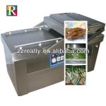 OEM supply low price automatic vacuum chicken feet packing machine for sale