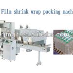 Film shrink wrapping machine, shrink wrap packaging machine