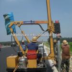 Hydraulic machine for guard rail construction