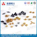 Tungsten carbide cutting tools with carbide tips