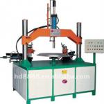 Edge cutting and hemming machine