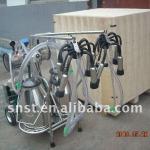 Double barrel milking machine