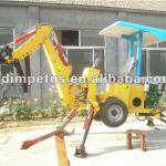 Towable backhoe with 22hp diesel engine