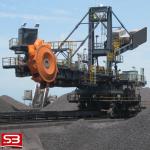 Stacker reclaimer for power station coaling installation and port