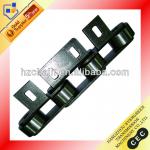 Large-roller conveyor chain with special attachment