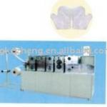 Nonwoven glove making machine