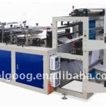 Plastic glove making machine