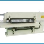 Slitting machine for slitting leather ,artifical ,plastic cloth