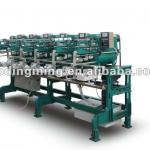 Winding machine with automatic oiling system