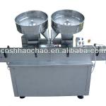 Capsule counting and filling machine