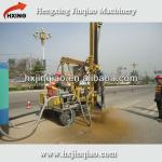 Hydraulic drilling rig for installing guardrail post