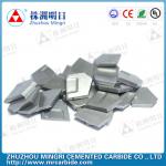 Tungsten carbide saw tips for mining tools