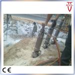 Hydraulic rock splitter for quarrying natural stone