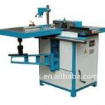 Woodworking spindle moulder with sliding table