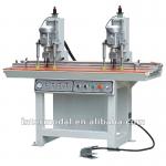 Two-head hinge boring machine