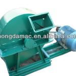 Low consumption wood chipper machine