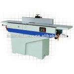 Wood surface planing machine-