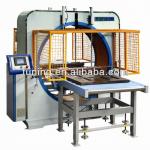 Wood wrapping machine