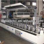 Profile wrapping machine for profile