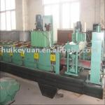 Roof tile forming machine