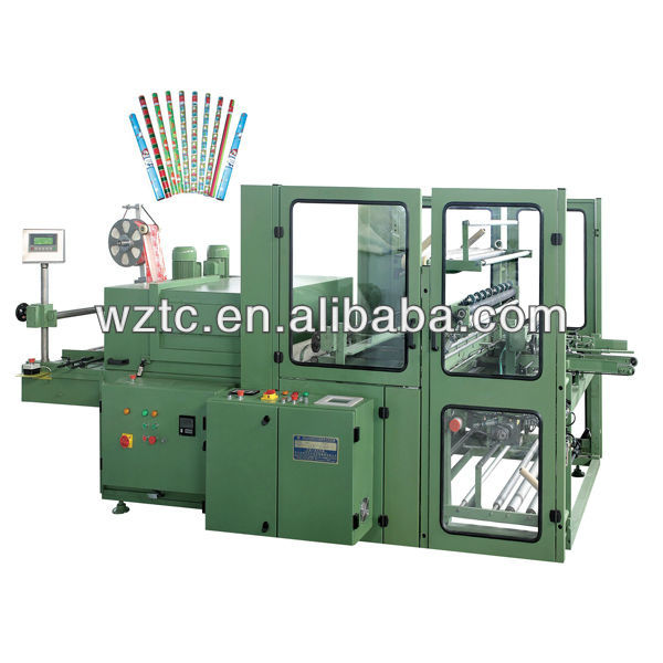 Automatic gift paper shrink packaging machine