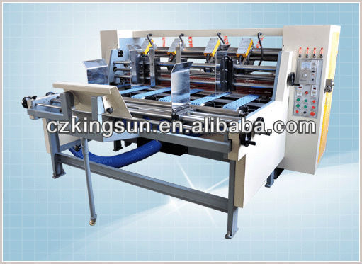 Automatic slitting machine for corrugated paperboard
