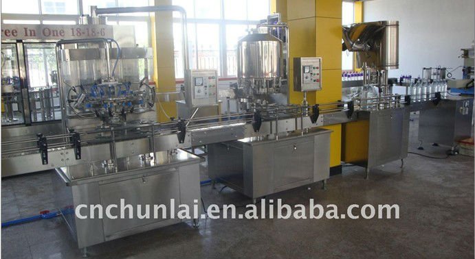 Bottle washing filling and capping machine