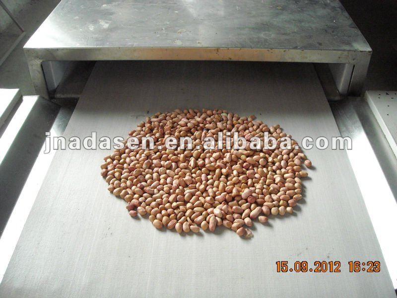 Continuous microwave peanut roasting baking machine