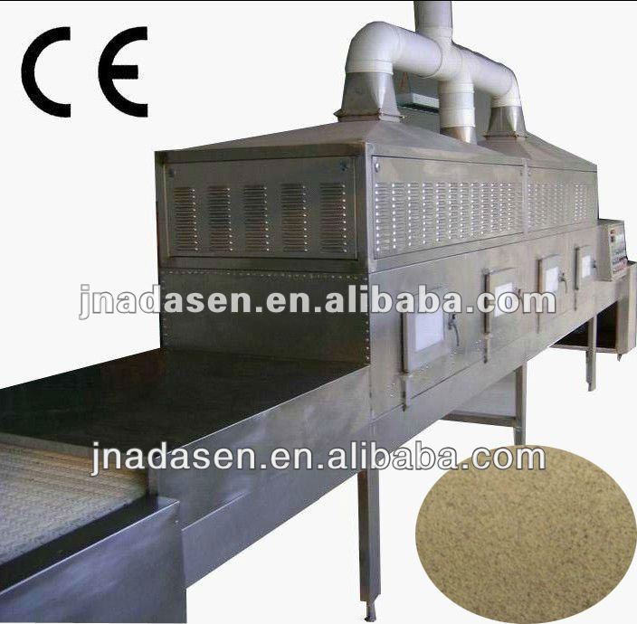 Continuous type microwave seasoning drying and sterilizing machine