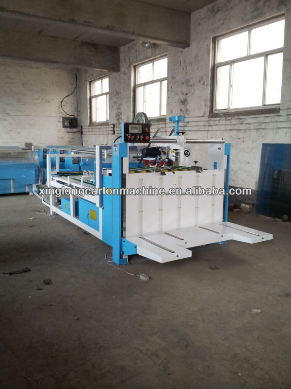 Corrugated carton gluing machine