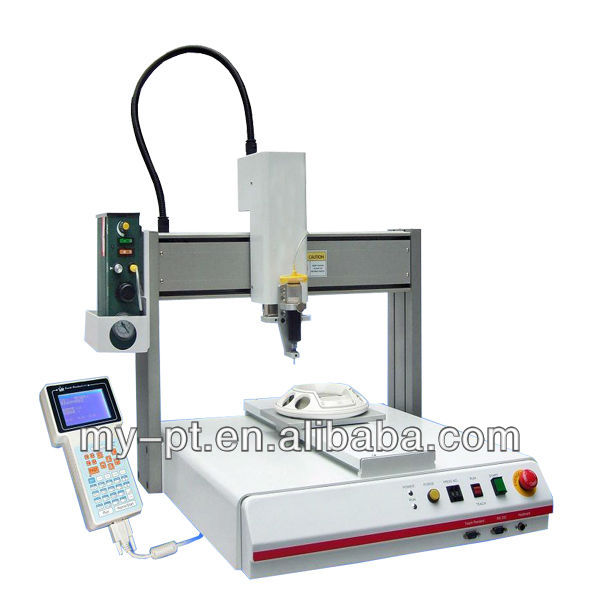 Desktop adhesive dispensing machine