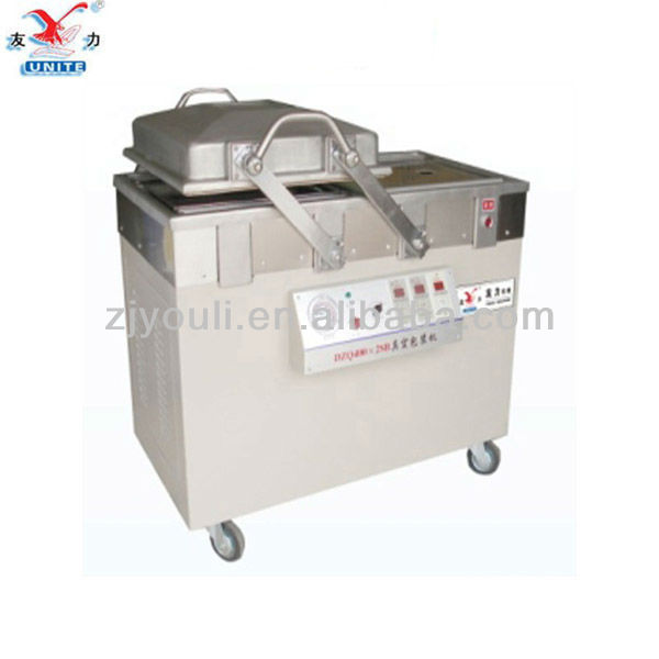 Double chamber vacuum packing machine