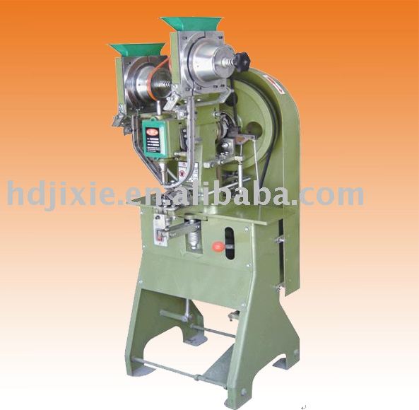 Double head eyelet machine