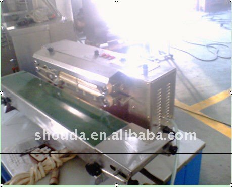 FILLING GAS SEALING MACHINE