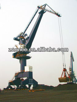 Four connecting rods portal crane with grab