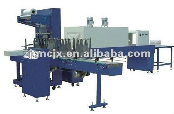 Fully automatic PE film shrinking packaging machine