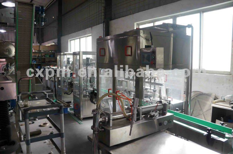 Guangzhou CX automatic filling capping labeling and sealing machine production line for liquid