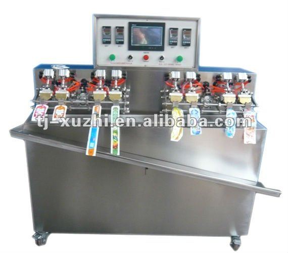 liquid filling and sealing machine