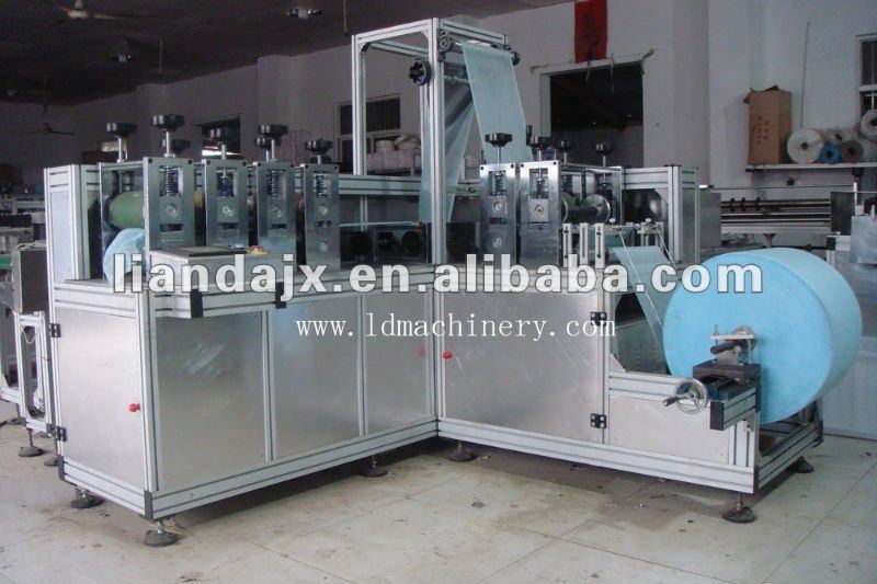 Non woven shoe cover making machine