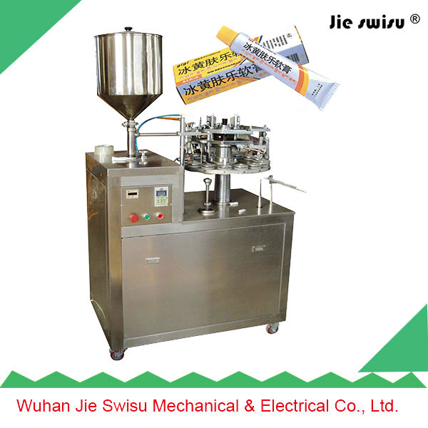 Plastic tube filling and sealing machine