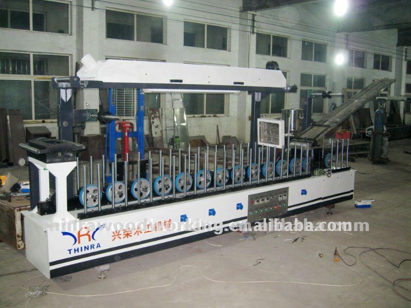 profile wrapping machine for cabinet and window
