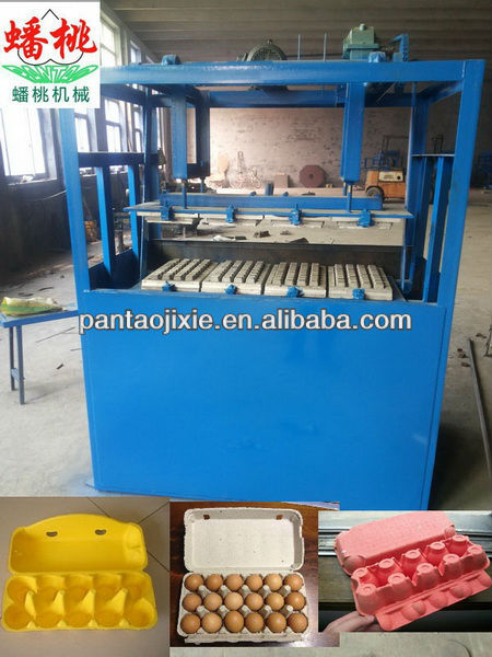 Reciprocating egg tray machine